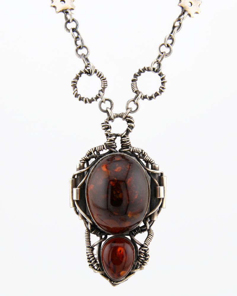 Silver necklace with ambers